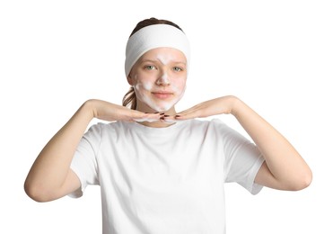 Photo of Teenage girl washing her face with cleanser on white background. Cosmetic product