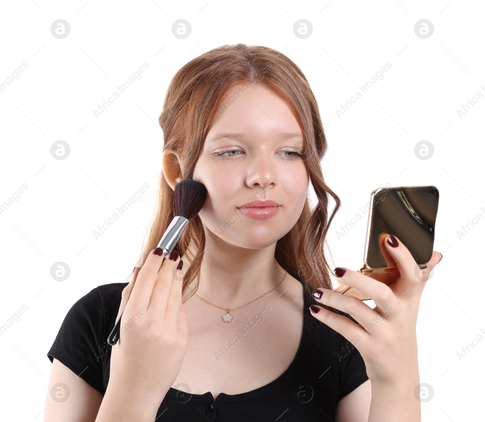 Photo of Teenage girl applying blusher with makeup brush on white background