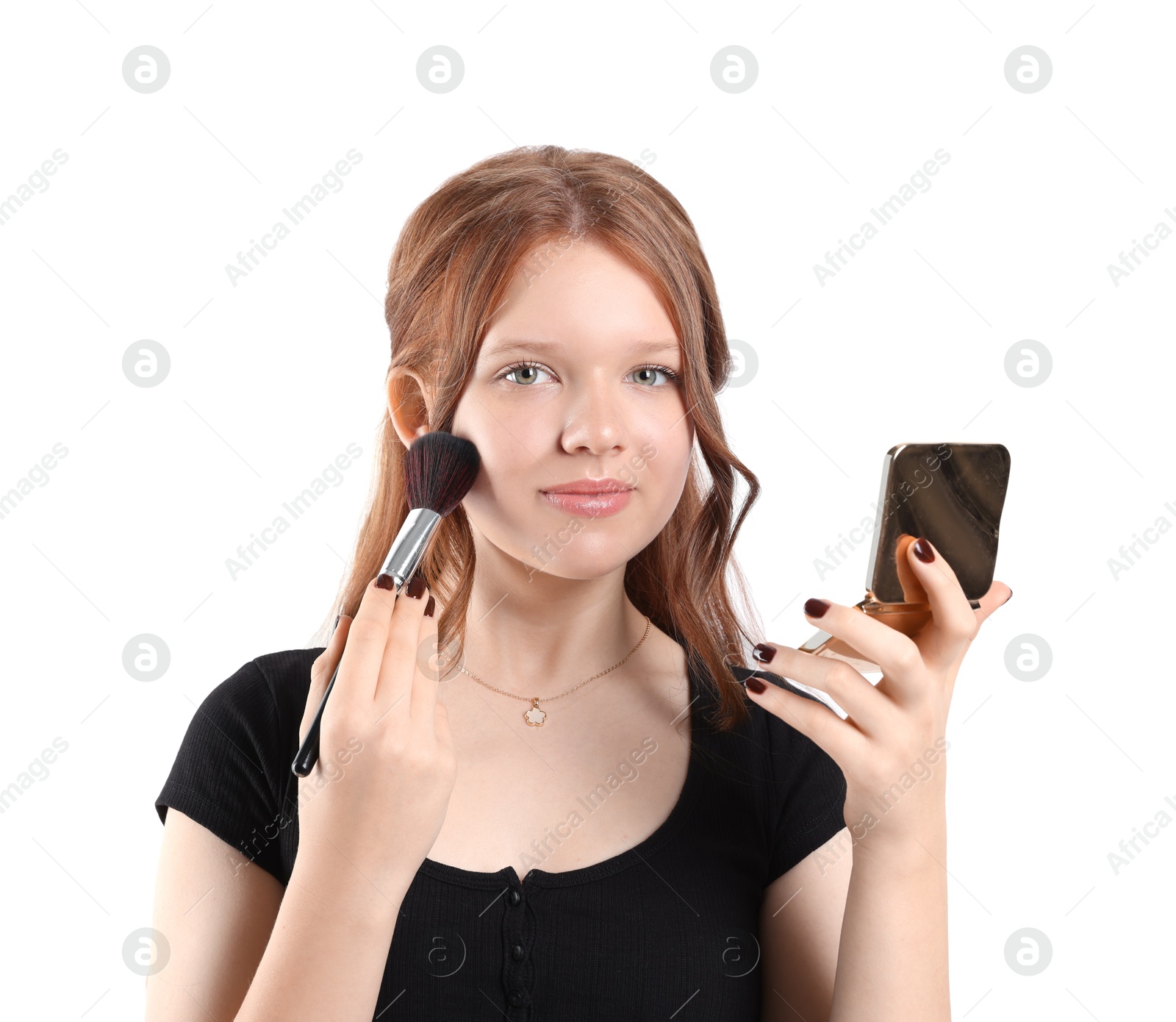 Photo of Teenage girl applying blusher with makeup brush on white background