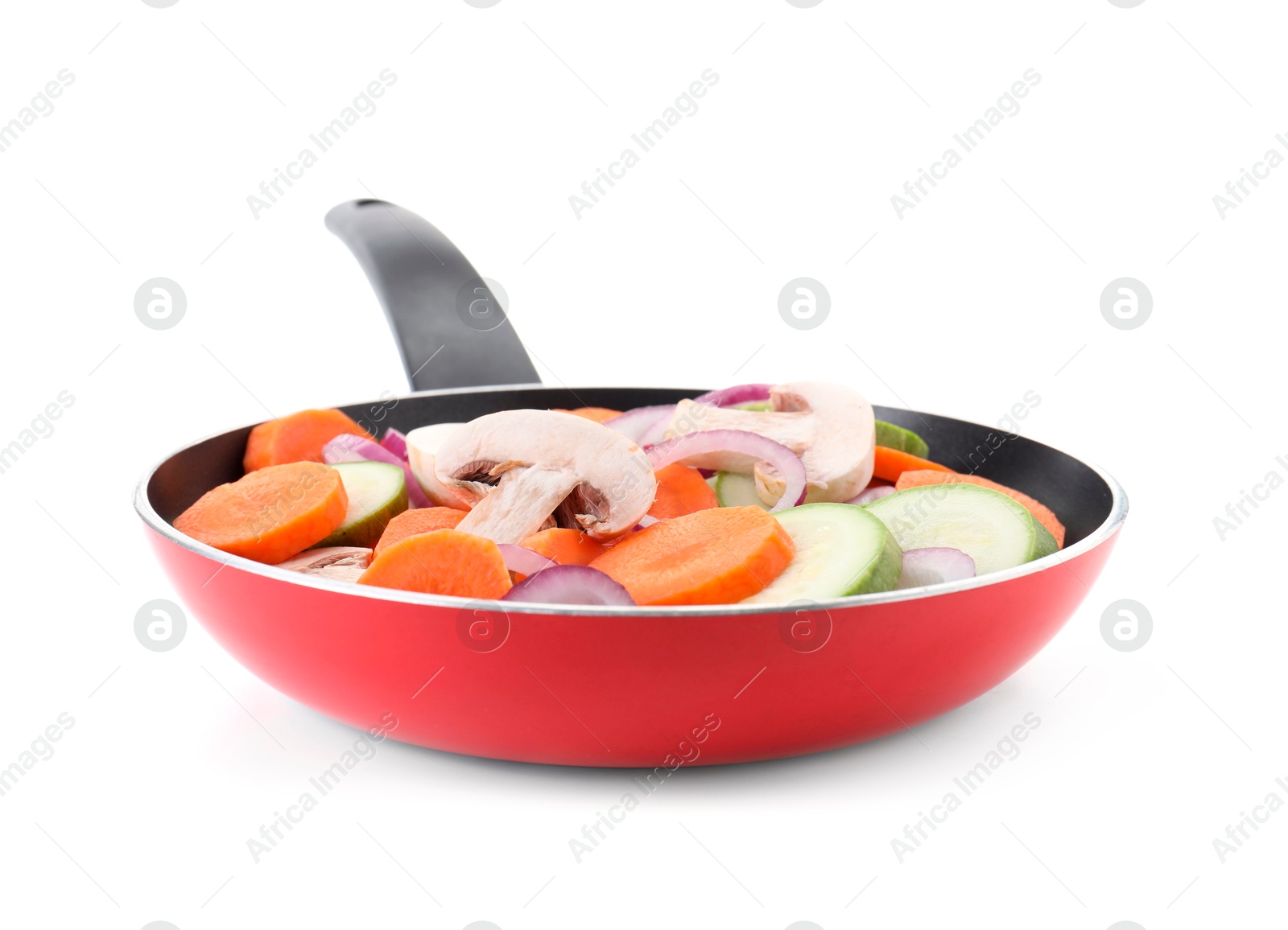 Photo of Frying pan with mix of fresh vegetables and mushrooms isolated on white