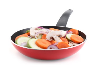 Photo of Frying pan with mix of fresh vegetables and mushrooms isolated on white