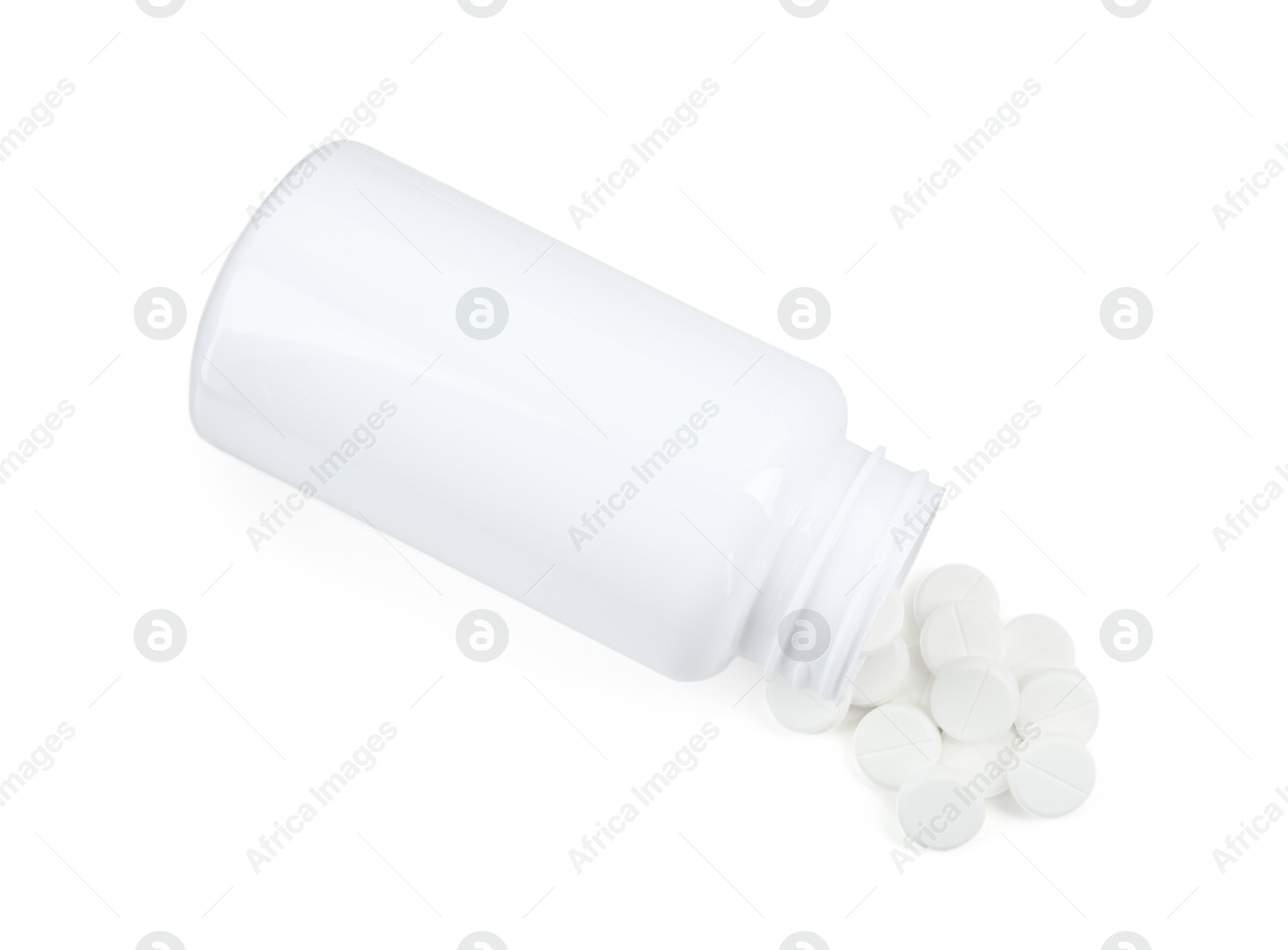 Photo of Medical bottle with antibiotic pills isolated on white, top view