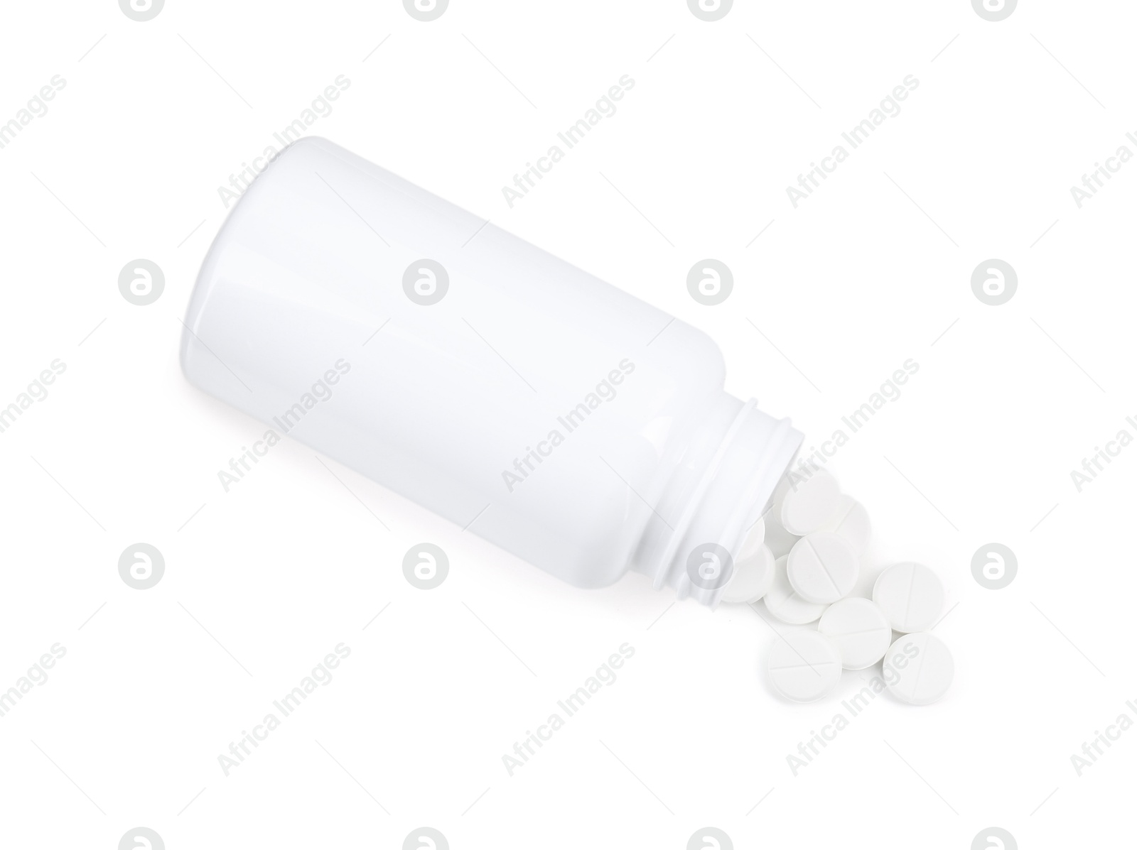 Photo of Medical bottle with antibiotic pills isolated on white, top view