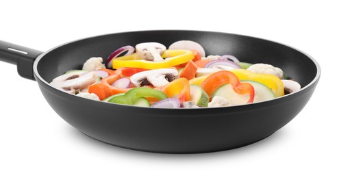 Photo of Frying pan with mix of vegetables and mushrooms isolated on white