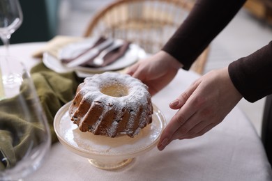 Photo of Woman setting table for dinner at home, closeup