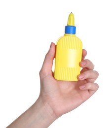 Photo of Woman with bottle of glue on white background, closeup