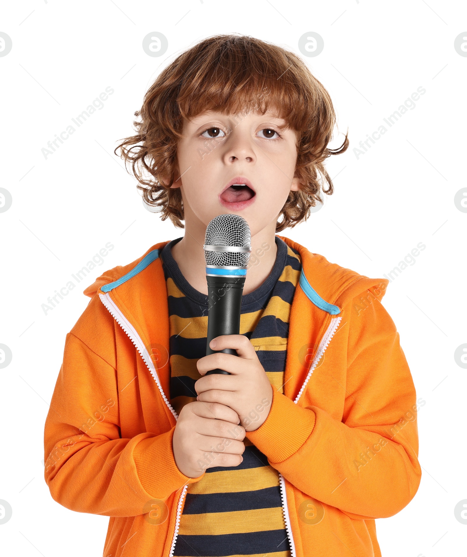 Photo of Little boy with microphone singing on white background