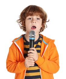 Little boy with microphone singing on white background