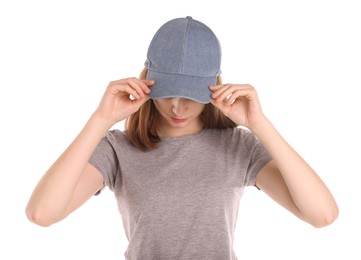 Photo of Woman in stylish baseball cap on white background. Mockup for design