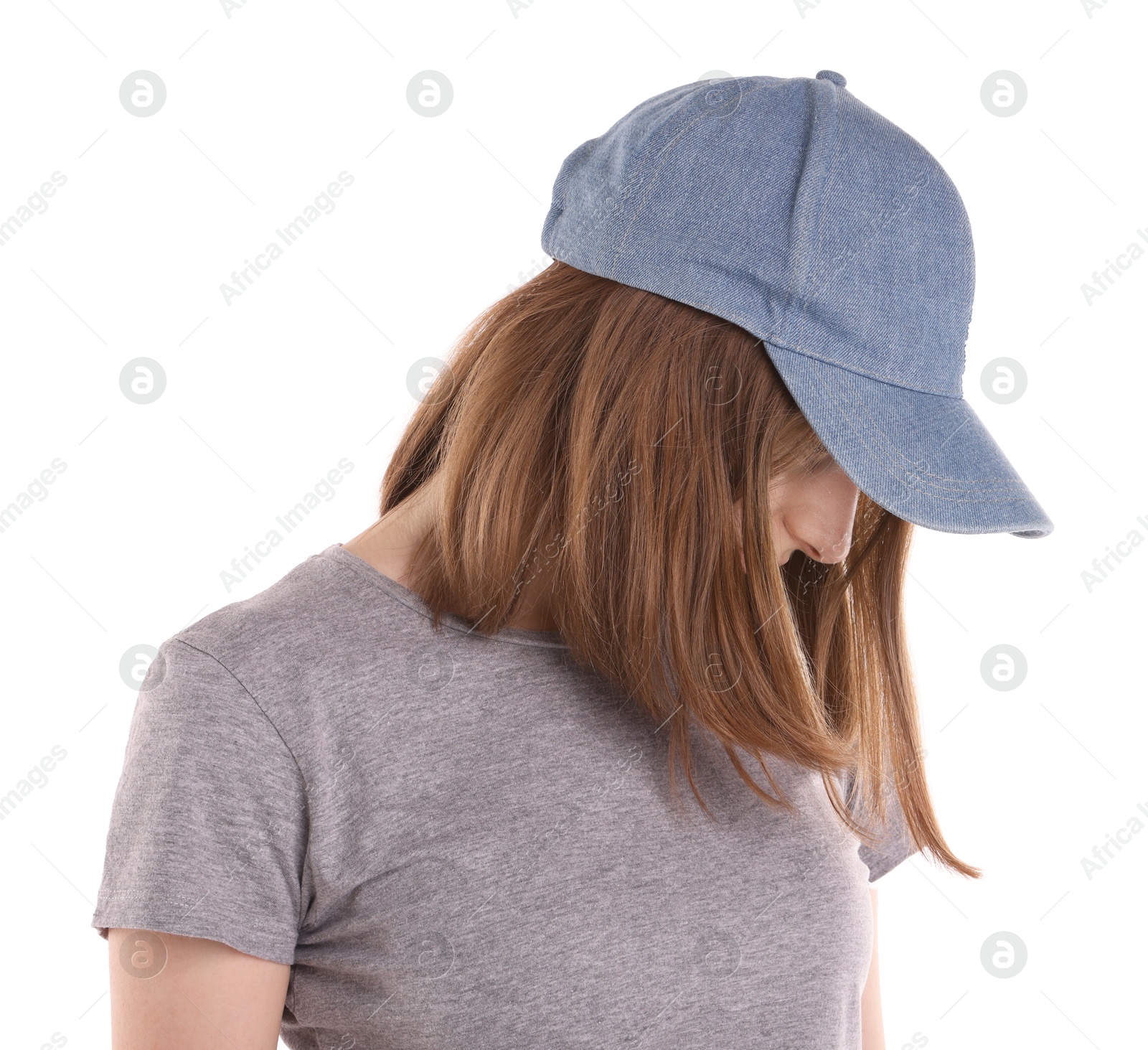 Photo of Woman in stylish baseball cap on white background. Mockup for design