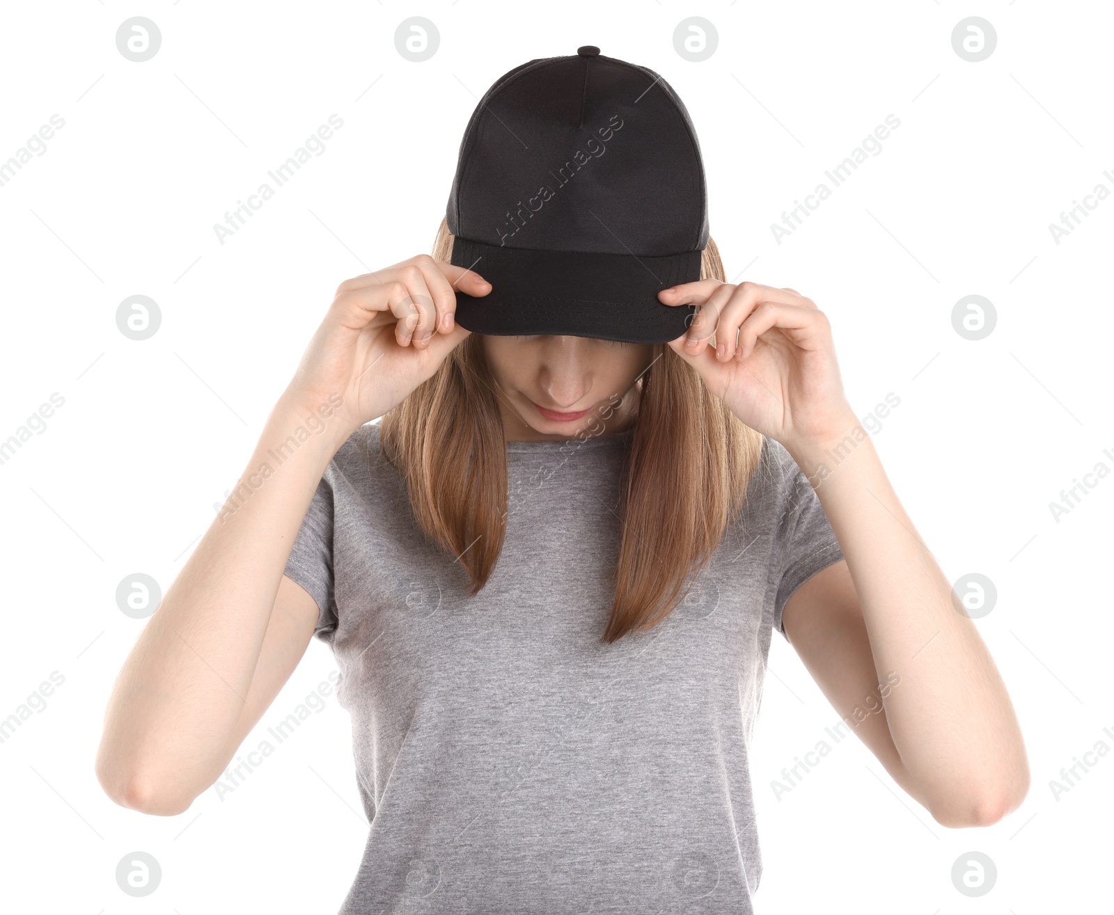 Photo of Woman in stylish baseball cap on white background. Mockup for design