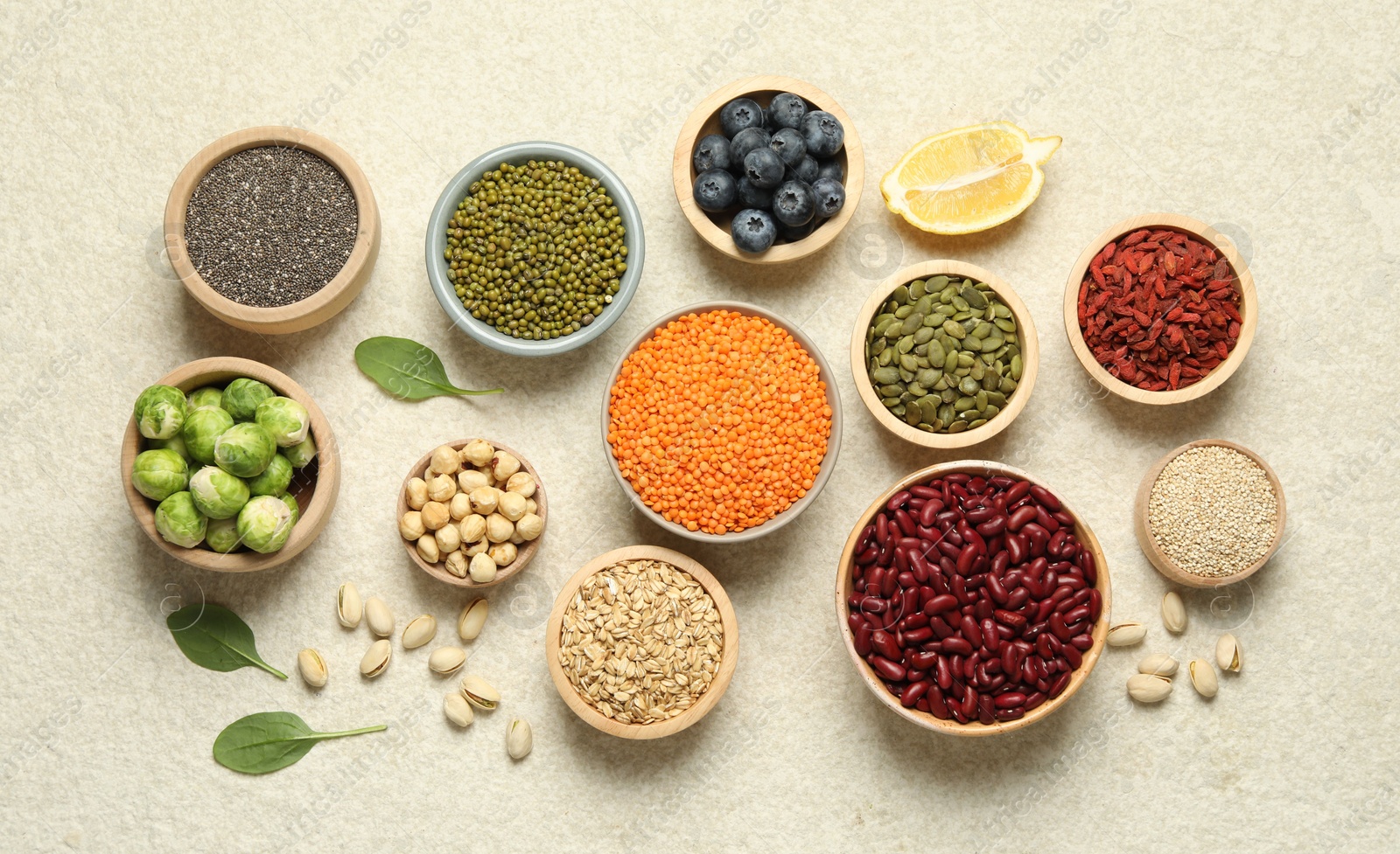 Photo of Different superfood products on light table, flat lay