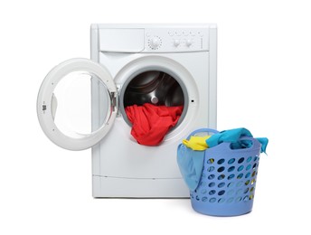 Photo of Washing machine and laundry basket with colorful clothes isolated on white