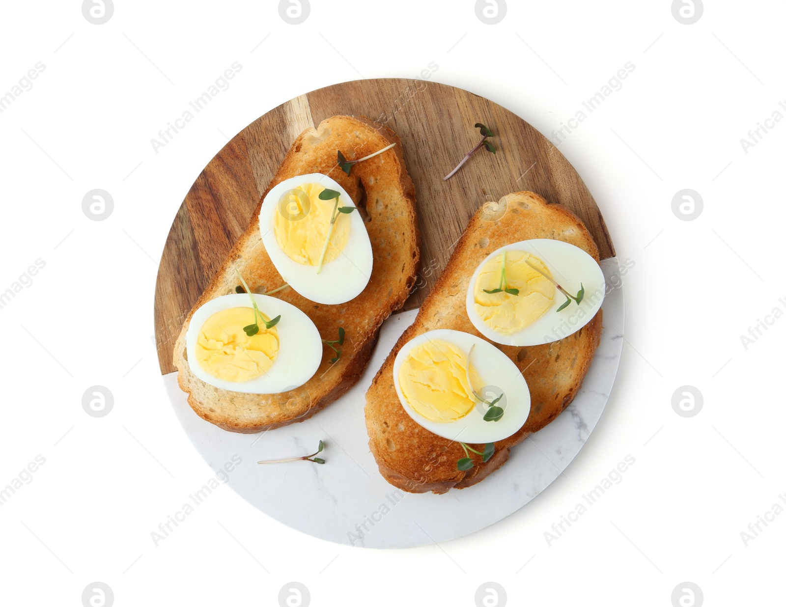 Photo of Sandwiches with hard boiled eggs isolated on white, top view