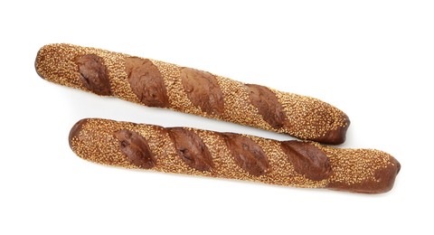 Photo of Fresh baguettes with sesame isolated on white, top view