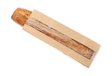 Photo of Fresh baguette in paper bag isolated on white, top view