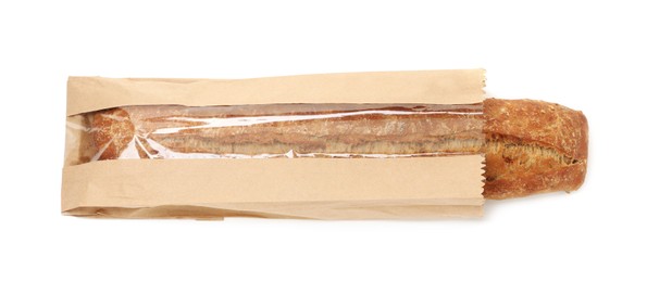 Photo of Fresh baguette in paper bag isolated on white, top view