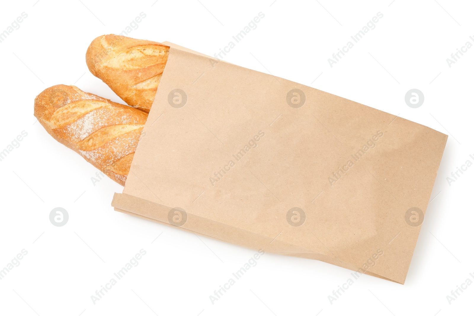 Photo of Freshly baked baguettes in paper bag isolated on white, top view