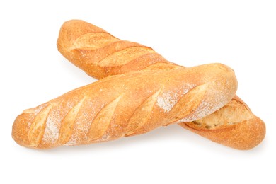 Photo of Two freshly baked baguettes isolated on white, top view