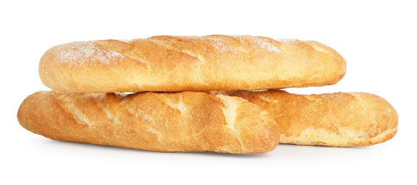 Photo of Three freshly baked baguettes isolated on white