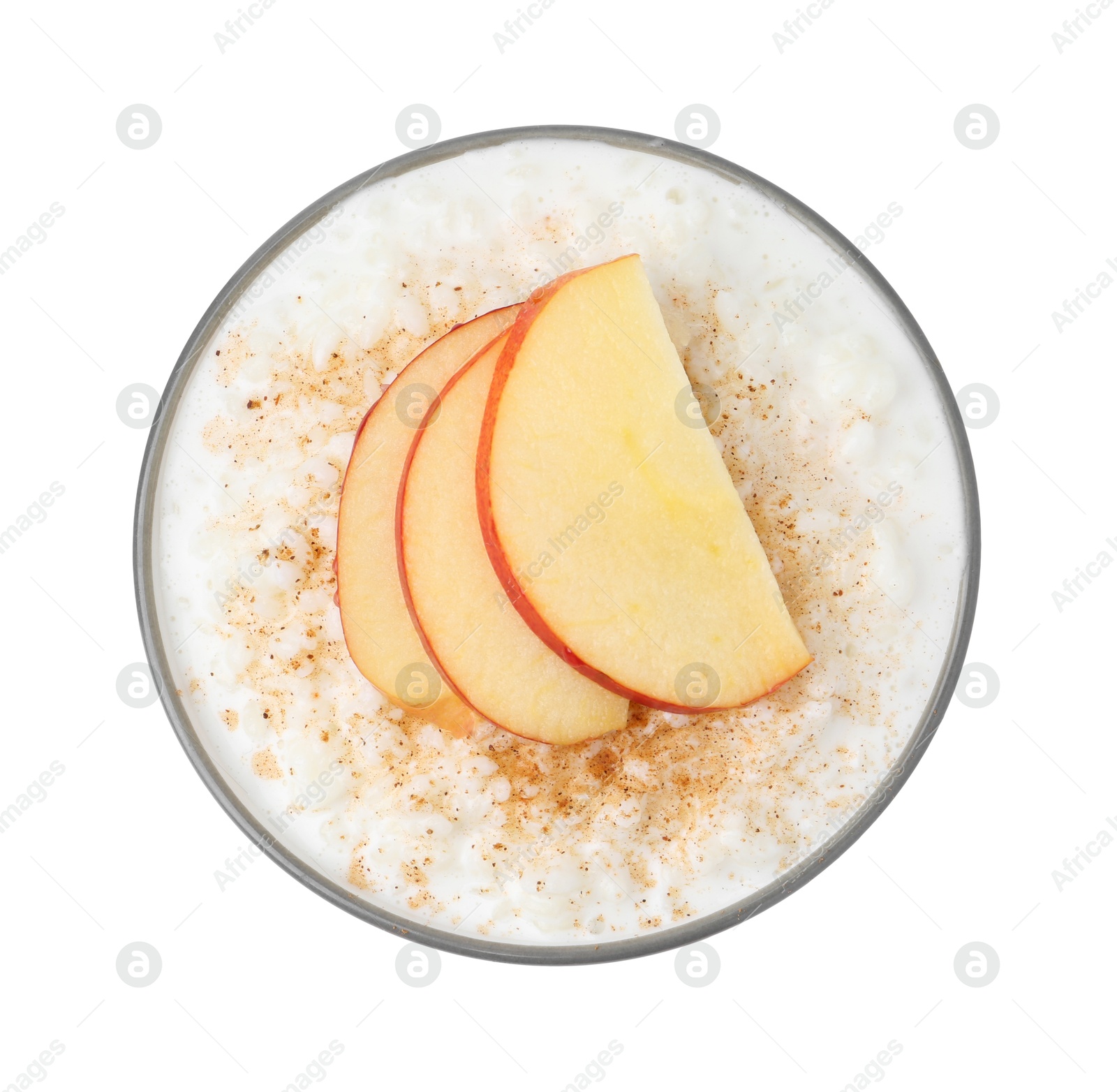 Photo of Delicious rice pudding with apples and cinnamon isolated on white, top view