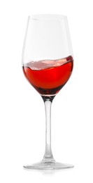 Photo of Rose wine splashing in glass on white background