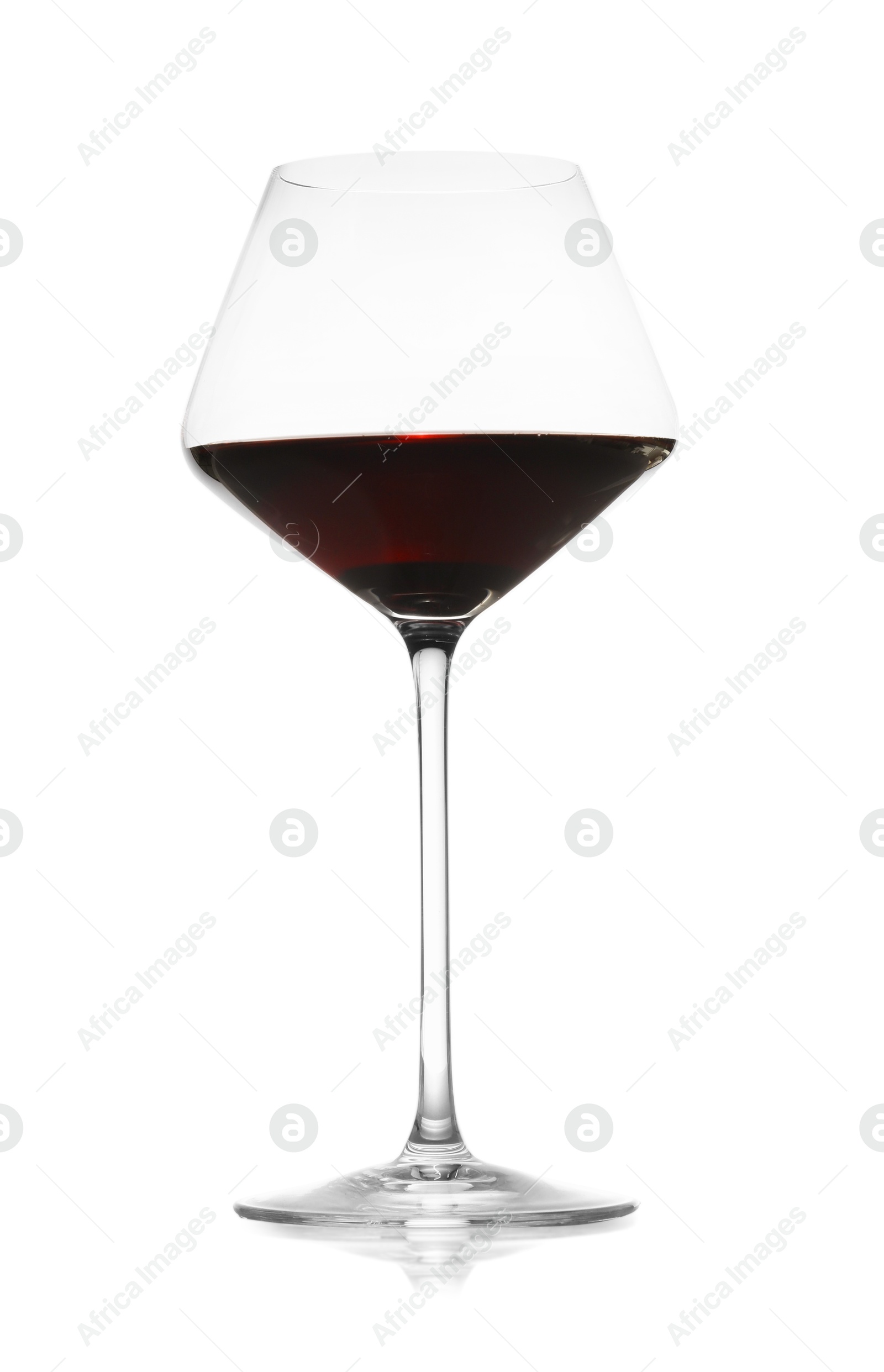 Photo of Red wine in glass on white background