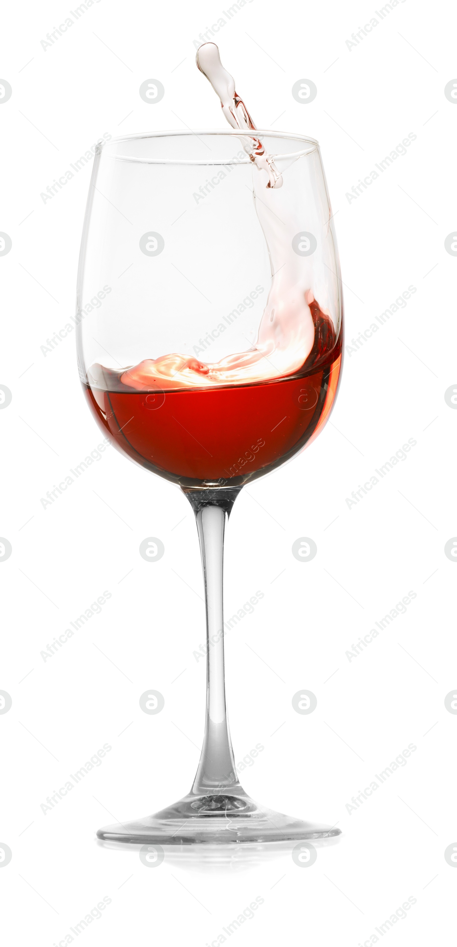 Photo of Rose wine splashing in glass on white background