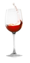 Photo of Rose wine splashing in glass on white background