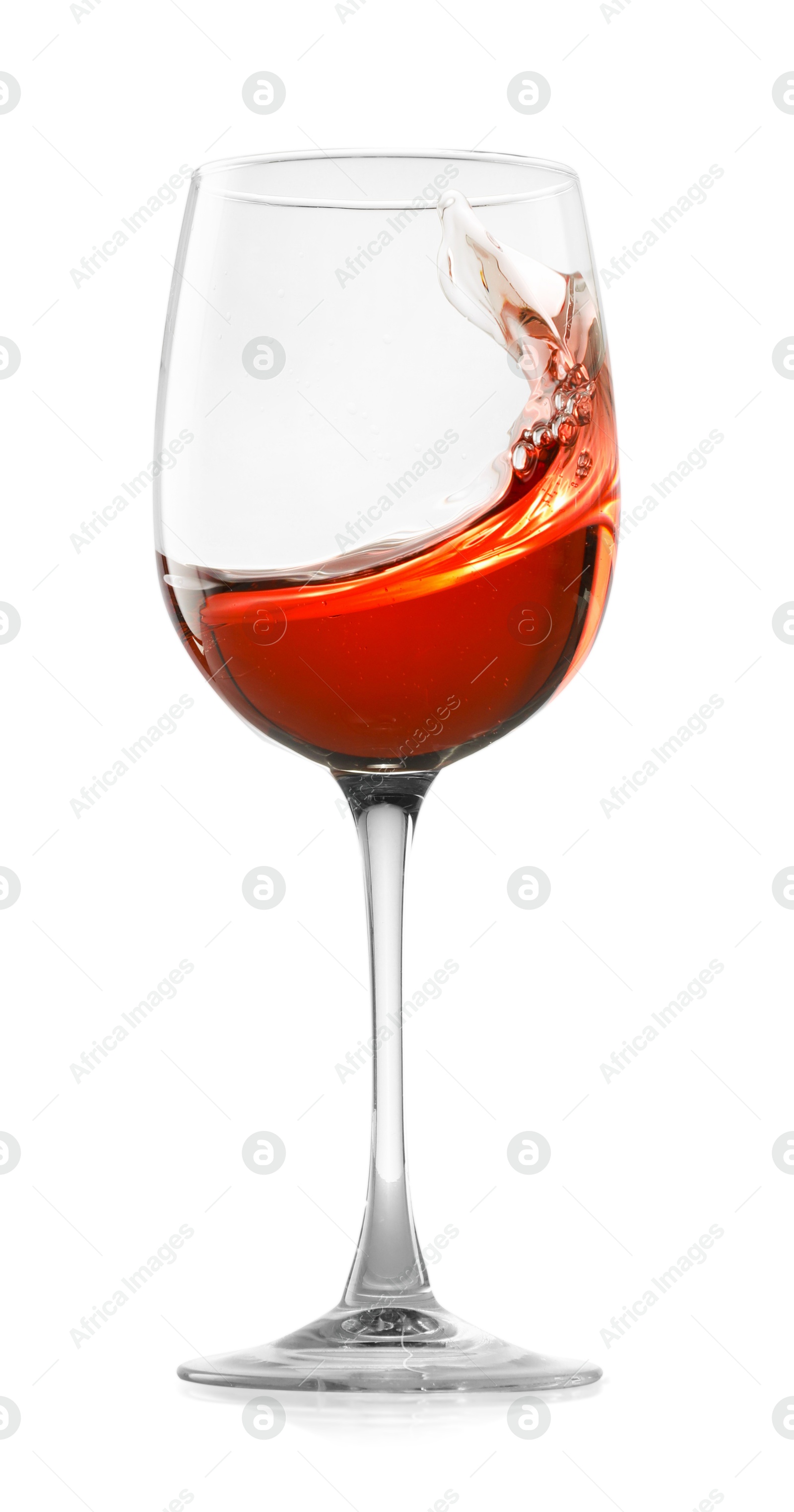 Photo of Rose wine splashing in glass on white background