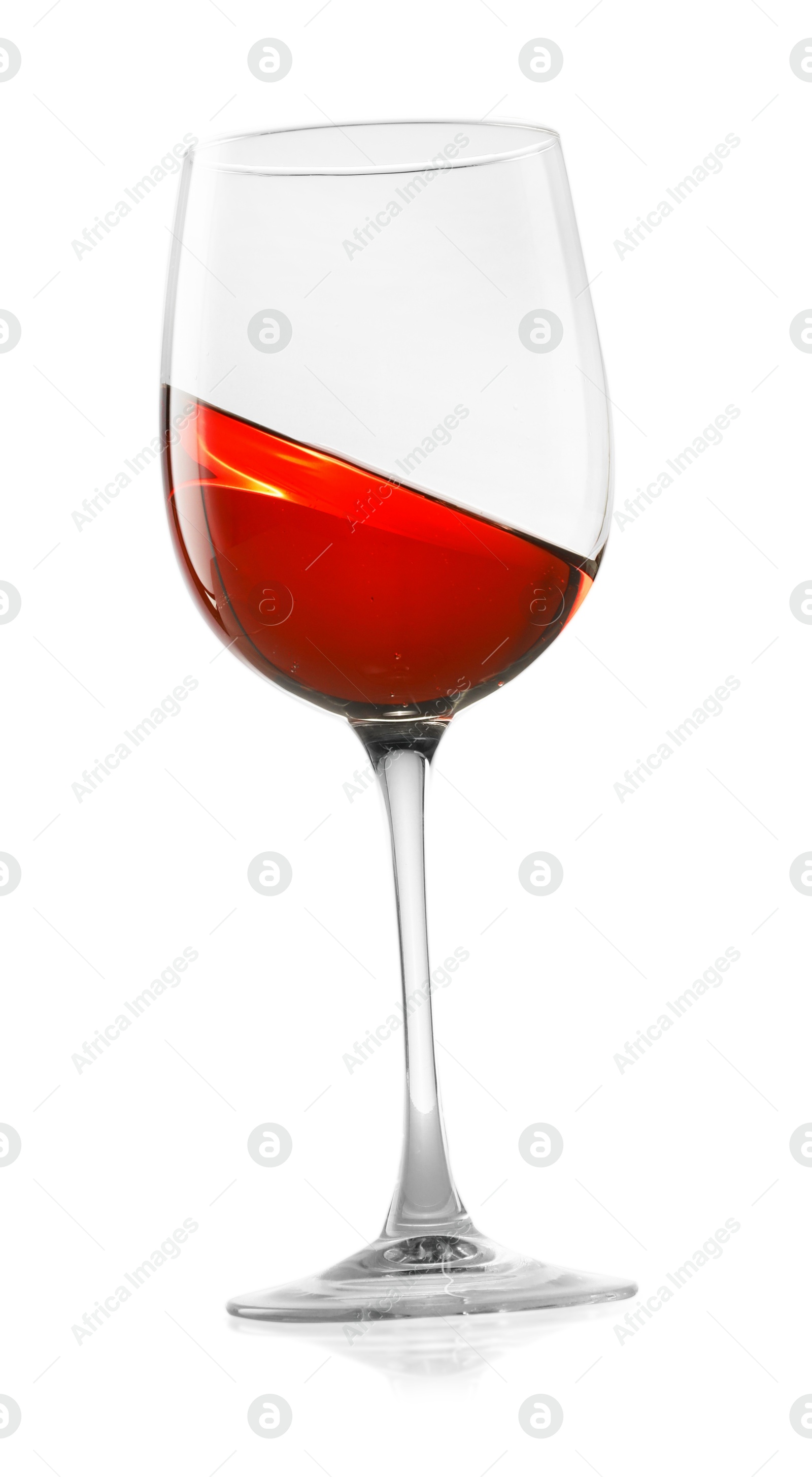 Photo of Rose wine splashing in glass on white background