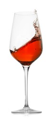 Photo of Rose wine splashing in glass on white background