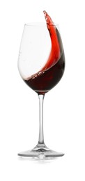 Photo of Red wine splashing in glass on white background