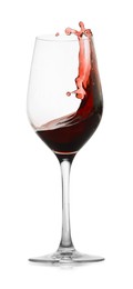 Photo of Red wine splashing in glass on white background