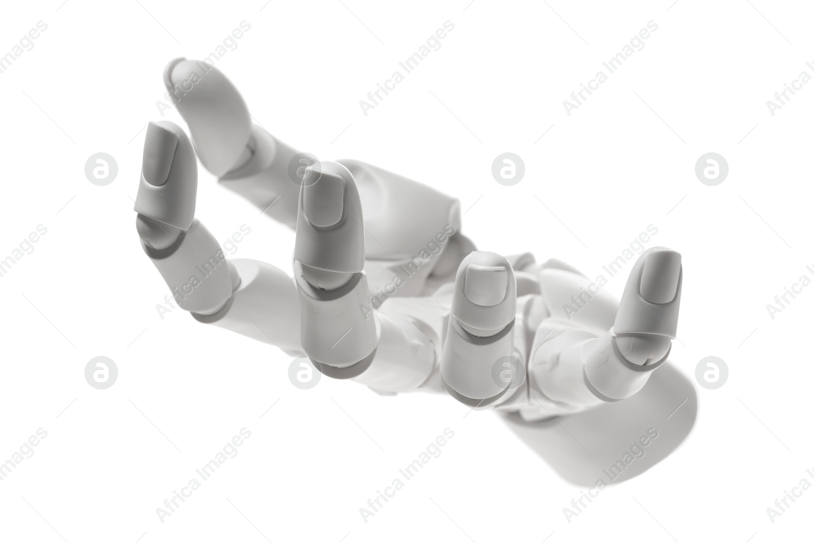 Photo of Artificial intelligence. Robot hand gesturing on white background