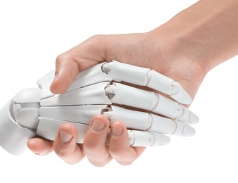 Photo of Artificial intelligence. Woman shaking hands with robot on white background, closeup