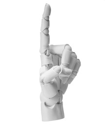 Photo of Artificial intelligence. Robot hand pointing at something on white background