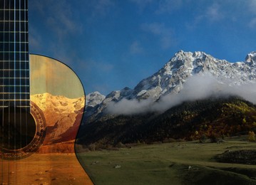 Image of Acoustic guitar and beautiful mountain landscape, double exposure. Inspiring or relaxing power of music