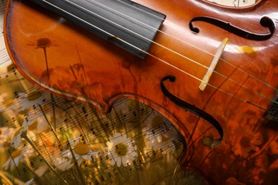 Image of Violin and beautiful daisies, double exposure. Inspiring or relaxing power of music