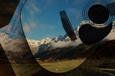 Image of Acoustic guitar, music sheets and beautiful mountain landscape, double exposure. Inspiring or relaxing power of music