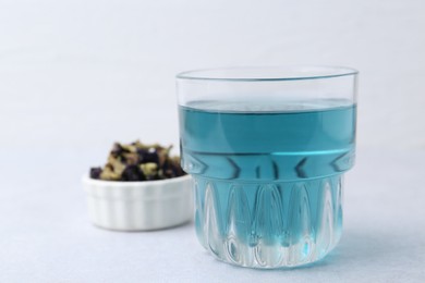 Photo of Delicious butterfly pea flower tea on light table