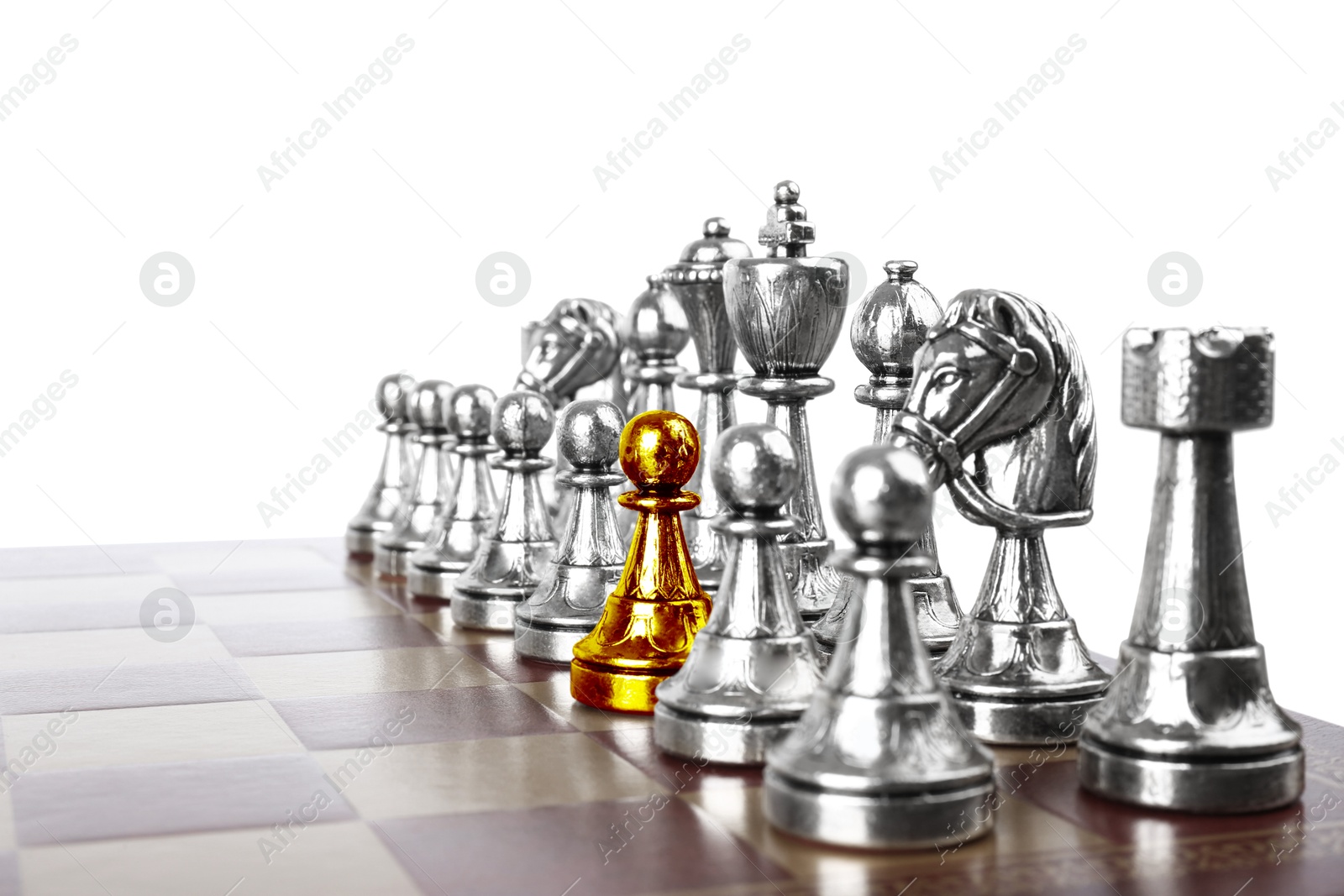 Image of One golden pawn among silver chess pieces on wooden chessboard