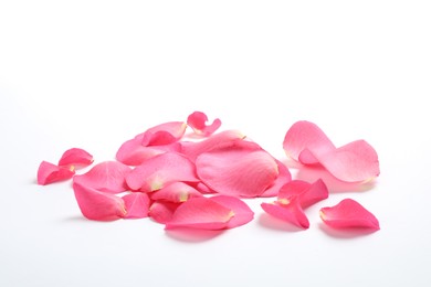 Photo of Fresh pink rose petals on white background