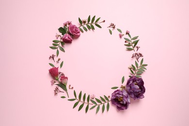 Frame made of beautiful flowers on pink background, flat lay with space for text. Floral composition