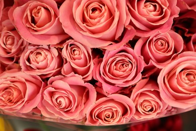 Photo of Beautiful bouquet of fresh roses, top view. Floral decor