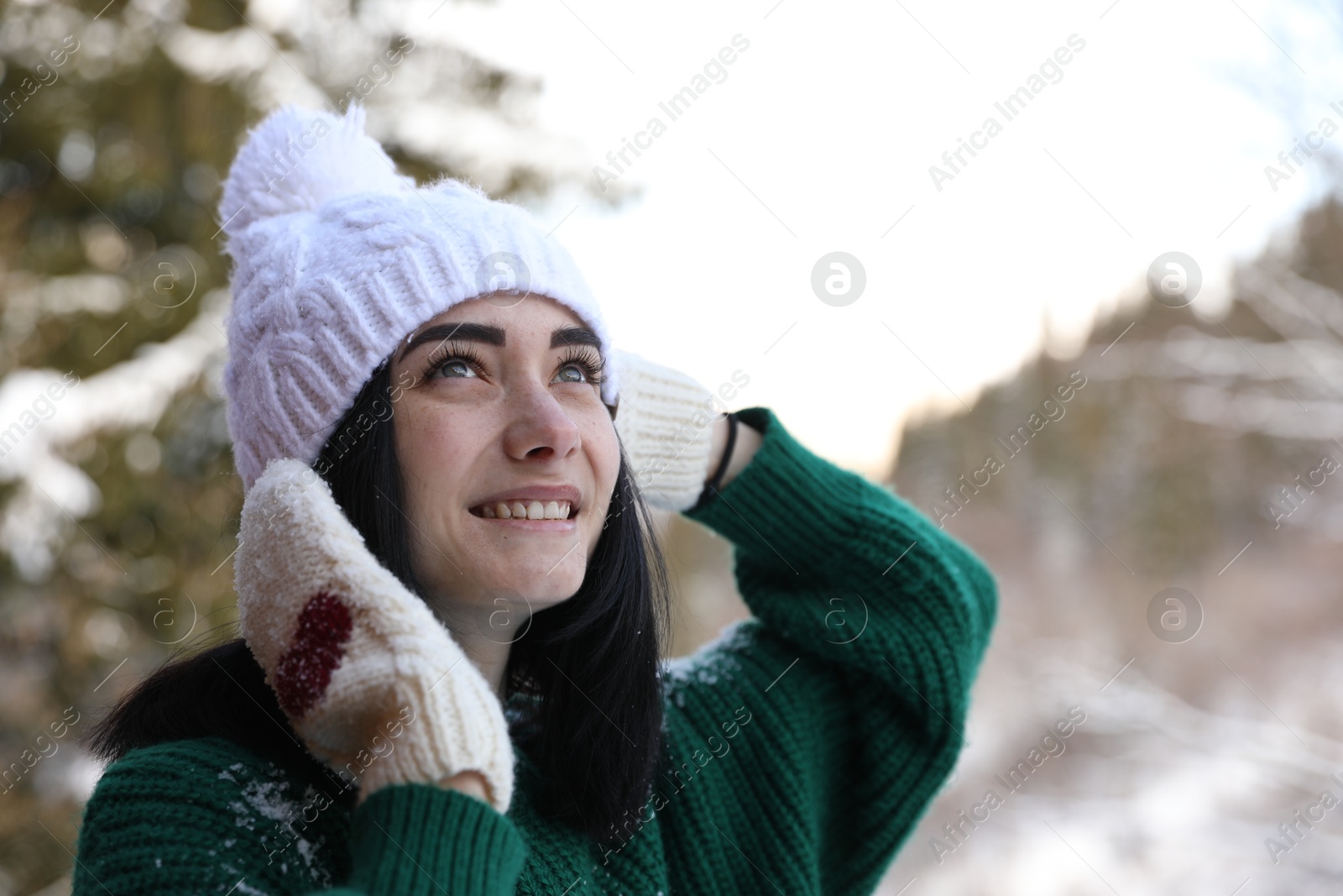 Photo of Portrait of beautiful young woman on winter day