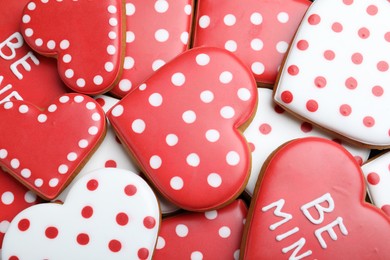 Photo of Delicious heart shaped cookies as background, top view. Valentine's Day