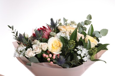 Photo of Beautiful bouquet with roses isolated on white