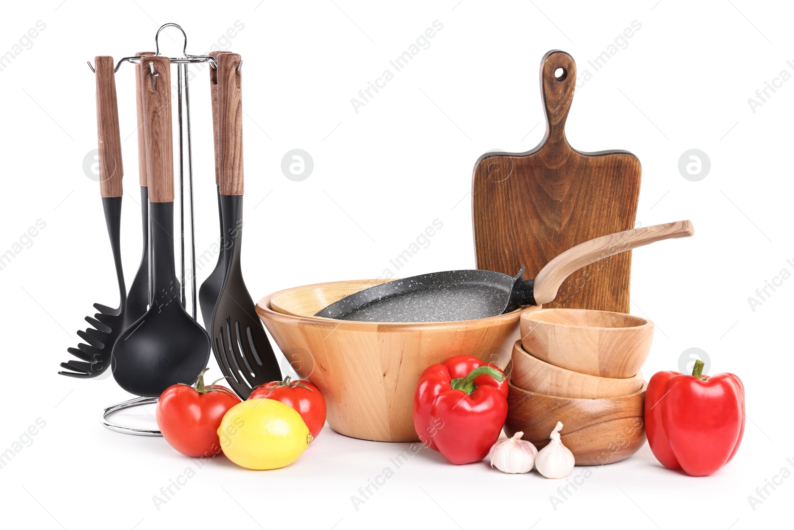 Photo of Different cooking utensils and products isolated on white