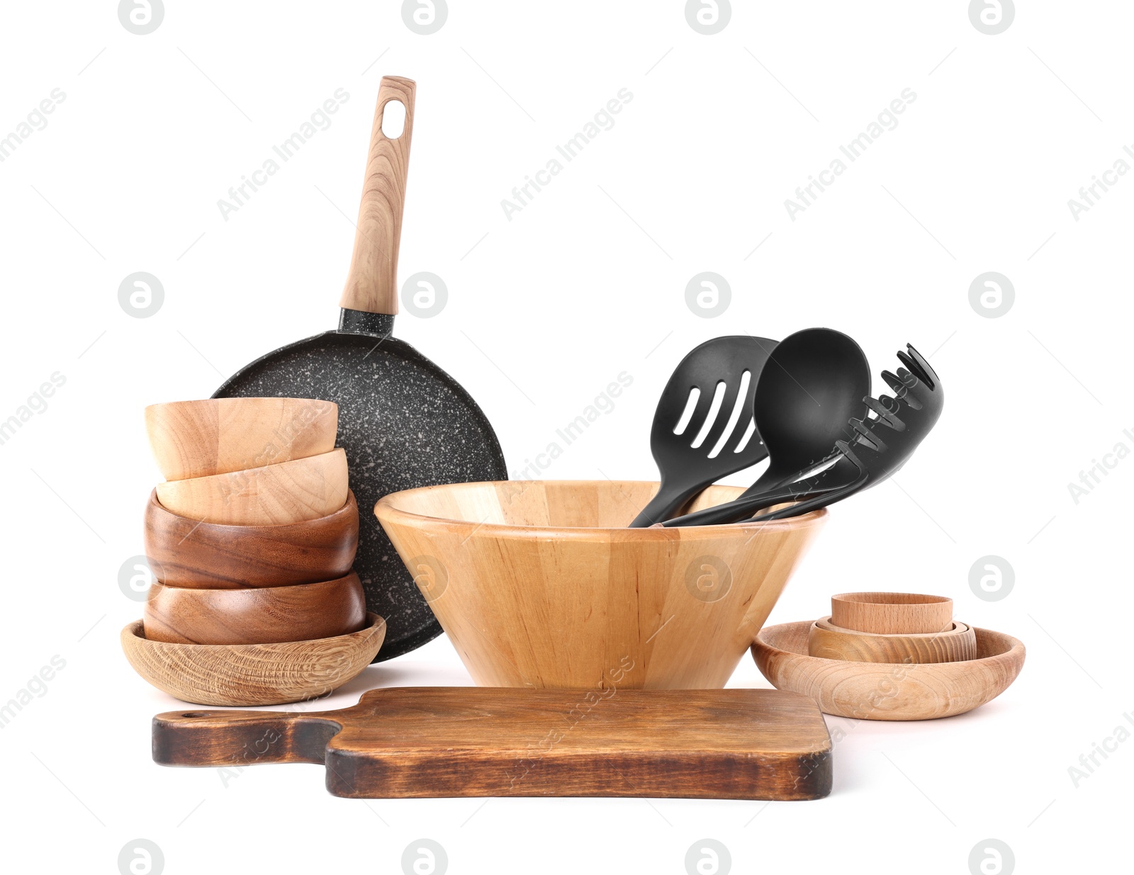 Photo of Set of different cooking utensils isolated on white